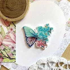 Акриловое украшение "Бабочка с цветами. Бирюзовая с розовым", 3,5х3 см, 1 шт